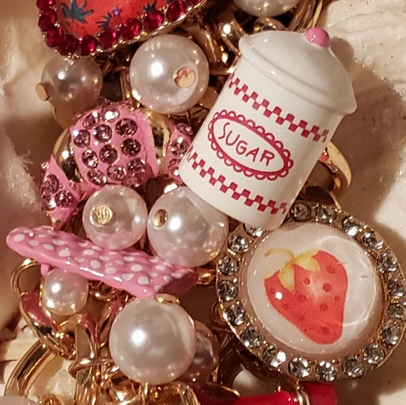 Betsey Johnson Babycakes Cluster Gold Tone Bracelet in Reds, Pinks and White. - Picture 4 of 9